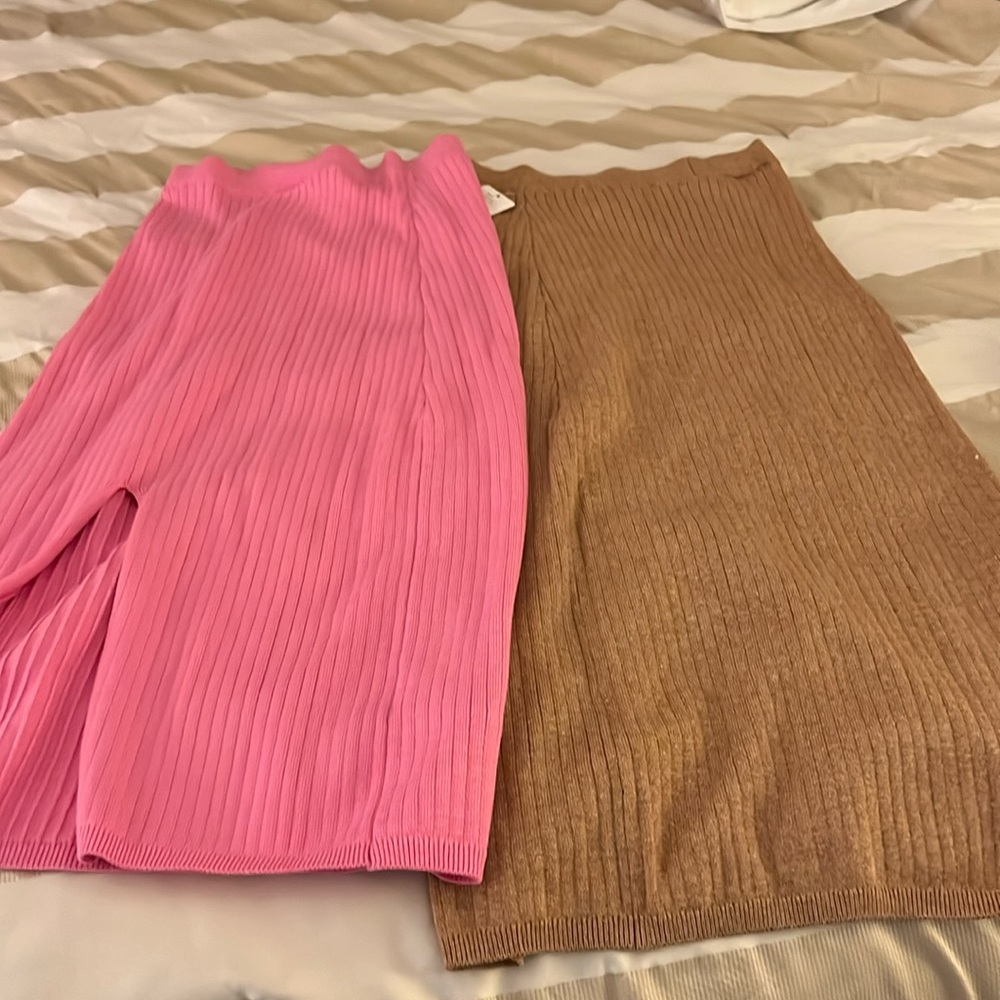 Two free people skirts. One new one worn once.